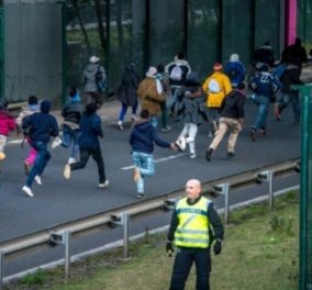 "Χάος" στη Γαλλία - Ένταση με πάνω από 800 μετανάστες να επιχειρούν να μπουν στη σήραγγα της Μάγχης