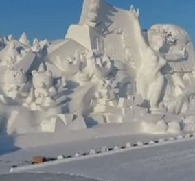 BINTEO: Δείτε ένα εντυπωσιακό γιγάντιο γλυπτό από χιόνι για τους Ολυμπιακούς του Πεκίνου- Υπέροχο!