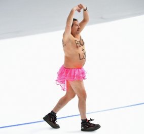 Απίστευτο βίντεο δείχνει ημίγυμνο άνδρα με ροζ φούστα στο παγοδρόμιο των Χειμερινών Ολυμπιακών Αγώνων 