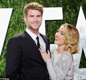 Μυστικός γάμος για τη Miley Cyrus και τον Liam Hemsworth - Οι πρώτες εικόνες που κόβουν την γαμήλια τούρτα  