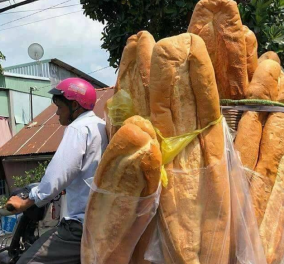 Αυτές οι φρατζόλες είναι γίγαντες: Ο Βιετναμέζος φούρναρης που προσελκύει το παγκόσμιο ενδιαφέρον με τα τεράστια ψωμιά του (φωτό)